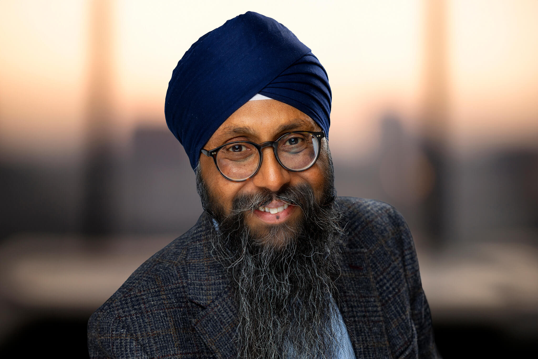 Headshot of Kam Singh, Executive Director of ESG 