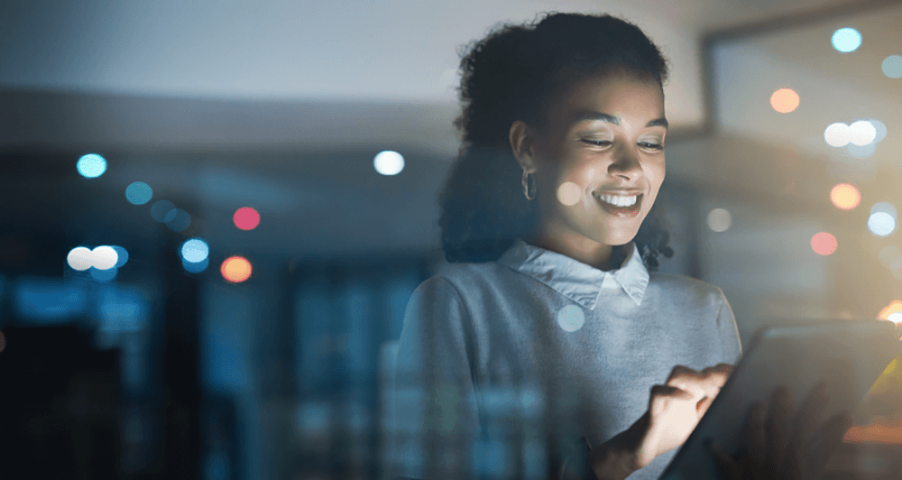 Business woman looking at a tablet. 