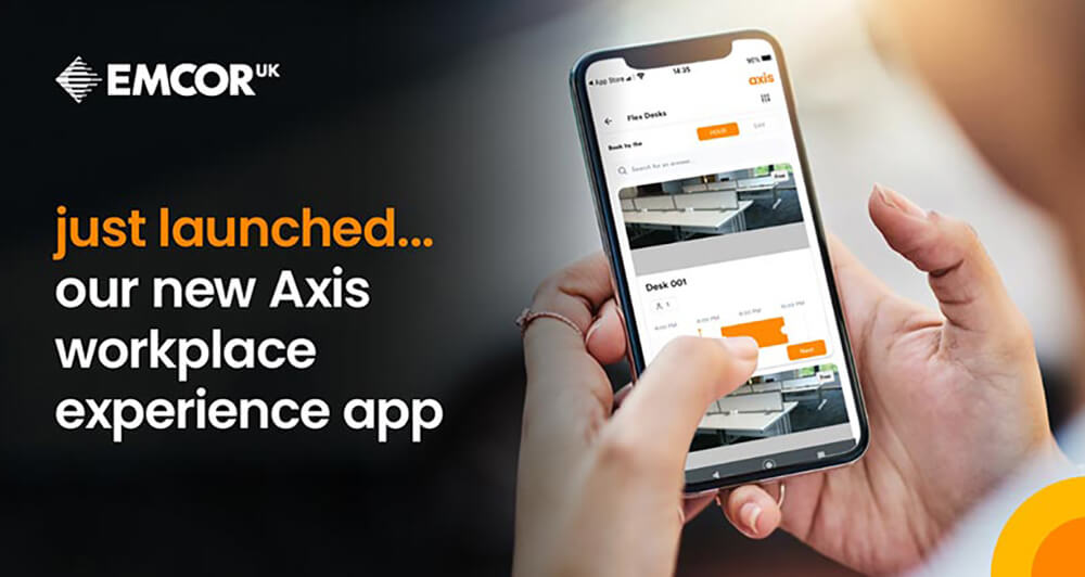 Two hands holding a phone working in the new Axis Workplace Experience app.